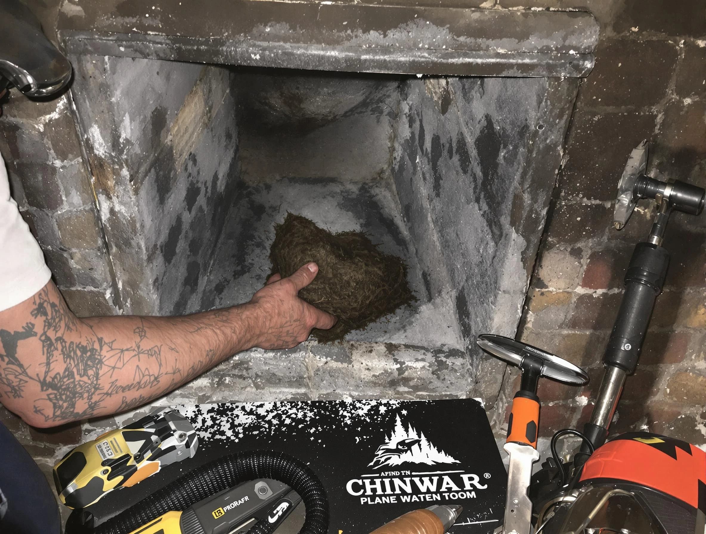 Moore Chimney Sweep safely removing debris and screening chimney in Moore, OK